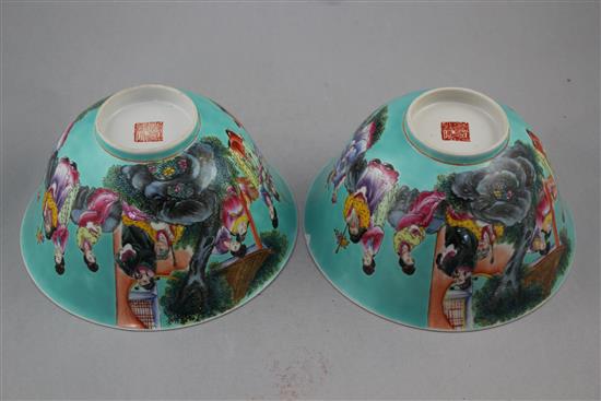 A pair of Chinese turquoise ground famille rose bowls, 20th century, 20cm.